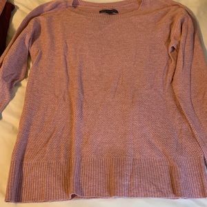 Pink American eagle sweater fits like a small